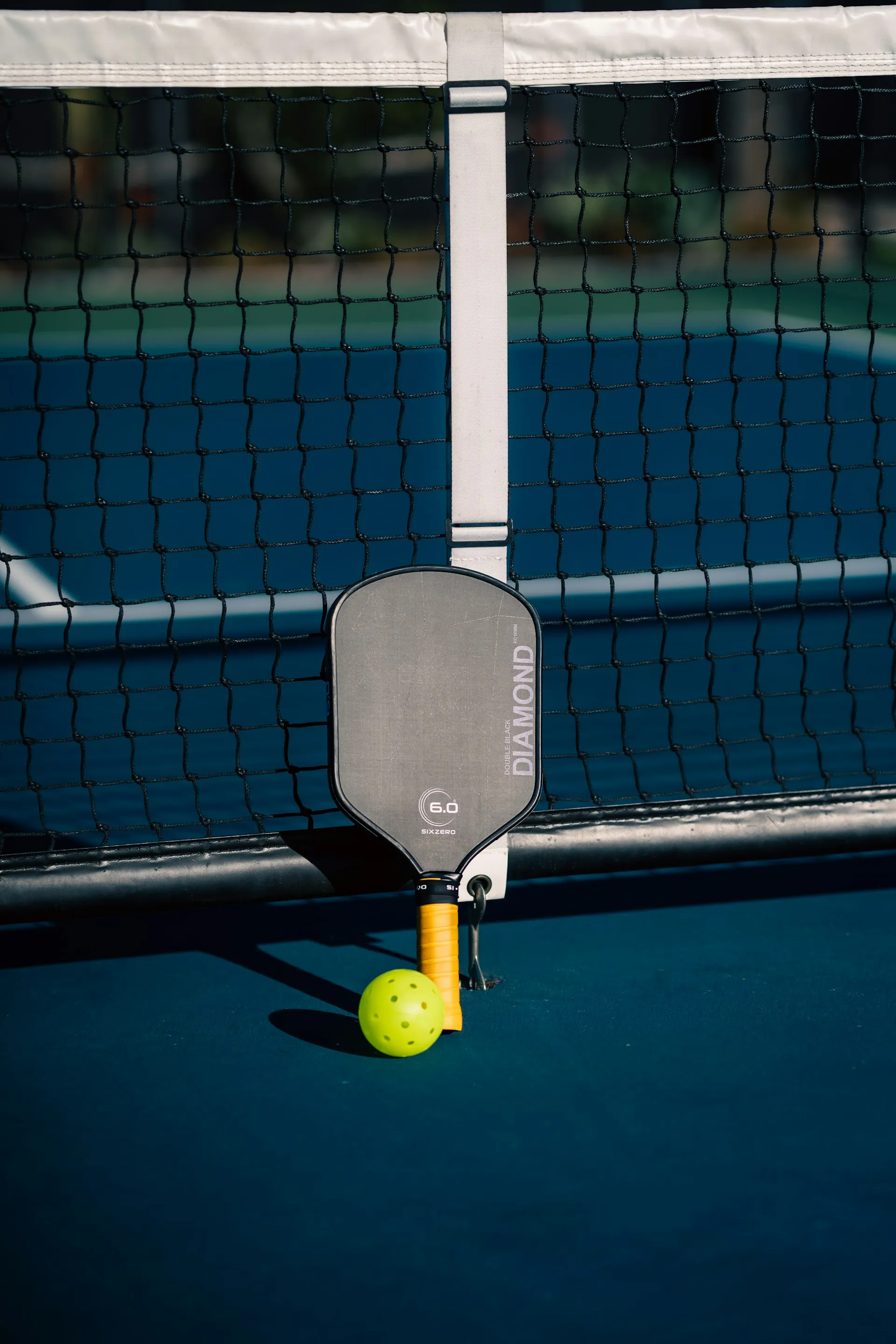 Padel balls on a court